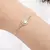 Charme Dourado Pulseira Unissex na internet