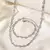 Imagem do Design Atemporal – Colar e Pulseira em Aço Esculpido
