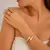 Espiral de Estilo – Pulseira Anel Unissex com Design Torcido em Metal Largo - Emmas Style