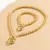 Coração Retrô – Pingente Dourado com Corrente de Bolas na internet