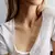 Aura Dourada – Colar em Camadas com Design Moderno e Elegante - comprar online