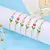 Pulseira Encanto da Primavera – Tulipa Rosa com Corrente Dourada na internet