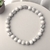 Pulseira Howlita Branca 6mm Detalhe Prata - comprar online