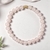 Pulseira Quartzo Rosa 6mm Detalhe Dourado - comprar online