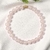 Pulseira Quartzo Rosa 6mm Detalhe Dourado