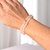 Pulseira Quartzo Rosa 6mm Detalhe Dourado na internet