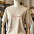 CAMISETA SAGRADA E HUMANA BEGE