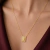 COLAR ESCAPULÁRIO PLACA COM CRUZ DETALHADA EM ZIRCÔNIAS SEMIJOIA OURO 18K - Le Bucô | semijoias | Brincos | Pulseiras | Colares | 