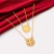 COLAR ESCAPULÁRIO REDONDO VAZADO SÃO BENTO AÇO DOURADO - Le Bucô | semijoias | Brincos | Pulseiras | Colares | 
