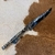 Imagem do FACA FORJADA EM INOX INTEGRAL – DORSO ENTALHADO – SUPORTE COM TRIDENTE E GARFOS