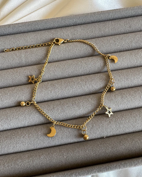 TOBILLERA LUNA/ESTRELLA ACERO DORADO