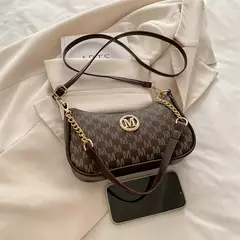 Bolsa crossbody estilo vintage, elegante e sofisticada na internet