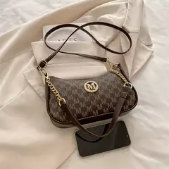 Bolsa crossbody estilo vintage, elegante e sofisticada