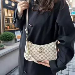 Bolsa crossbody estilo vintage, elegante e sofisticada na internet