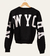 BUZO FRISA CROP NY. ESTAMPA ESPALDA