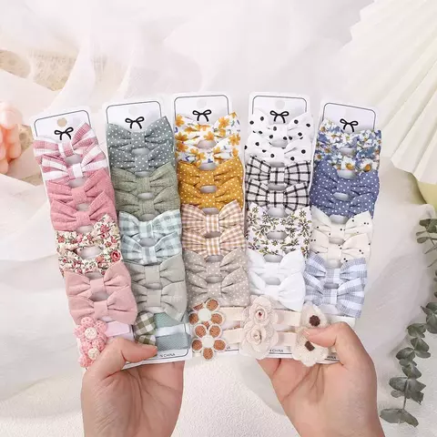 Kit com 5 pares de Laços para o Cabelo com Grampo