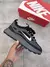 NIKE BAILLELI PRETO C/ CINZA