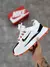 Imagem do NIKE BAILLELI BRANCO C/ LARANJA
