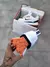 NIKE BAILLELI BRANCO C/ LARANJA na internet