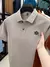 Marca de luxo 100% algodão camisa polo masculina lapela carta impressão manga curta verão 2025 nova tendência da moda magro camiseta masculina topo