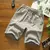 2025 Shorts brancos Homens Estilo Japonês Poliéster Correndo Shorts Esportivos para Homens Casual Verão Cintura Elástica Sólidos Shorts Roupas - loja online