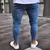 Calça jeans rasgada estilo jogador na internet