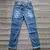 Calça jeans rasgada estilo jogador