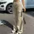 Calça cargo com cintura ajustável na internet