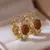 Brincos de argola epóxi de pedra de cristal dourada - comprar online