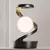 Luminária de Mesa Rotativa com Carregador Sem Fio - loja online