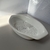 Fuente ceramica oval Sync en internet