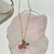COLAR PINGENTES FORMAS CRISTAL TURMALINA ROSA CRAVAÇÃO MEIA-INGLESA - comprar online