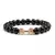 Pulseira Masculina de Pedra Vulcânica com Pingente de Haltere – Estilo e Força no Seu Pulso