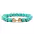 Pulseira Masculina de Pedra Vulcânica com Pingente de Haltere – Estilo e Força no Seu Pulso - loja online