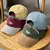 Boné Patchwork Bordado Unissex – Estilo Urbano com Aba Curva e Ajuste Snapback - comprar online