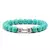 Pulseira Masculina de Pedra Vulcânica com Pingente de Haltere – Estilo e Força no Seu Pulso