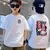Camiseta de manga curta com grafite estampada