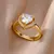 Anel Feminino de Coração em Aço Inoxidável – Zircão Banhado a Ouro, Estilo Elegante