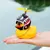 Pato Decorativo com Capacete e Hélice para Carro ou Moto – Estilo Único no Painel - comprar online