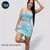 Modelo luciendo conjunto falda short con blusa M022 en color verde manzana, ajustado al cuerpo, ideal para uso casual o salidas