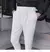 calça de alfaiataria masculina casual de cintura alta e perna reta na internet