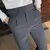 calça de alfaiataria masculina casual de cintura alta e perna reta na internet