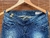 Jeans Cintura Baixa e barra cortada – M.Officer - Efeito Desapego