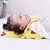 Travesseiro de Proteção para Cabeça de Bebê | Little Bee | Chapéu Anti-Queda - Mais segurança e tranquilidade para os primeiros passos do seu bebê! O travesseiro de proteção Little Bee é um acessório essencial para proteger a cabecinha do seu pequeno durante quedas e tombos. Com design fofo de abelhinha e alças ajustáveis, ele é leve, confortável e não atrapalha os movimentos do bebê. - loja online