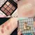 Imagem do Paleta de Sombras ScarletMuse™ | Sua beleza, seu poder em cada cor -Vibrante. Sedutora. Intensa. Brilhante. Mística.