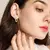 Aura D’Oro ✨ | Argolas elegantes com brilho dourado e prateado - loja online