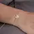 PULSEIRA DE BORBOLETA CRAVEJADA CRISTAL - PRATA 925.