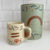 CANECA DE CERÂMICA CICLO DOS SONHOS - loja online