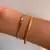 PULSEIRA MALHA FITA 3mm BANHO RÓDIO BRANCO OU OURO 18K | 17cm na internet