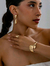 CONJUNTO DOURADO ANEL AJUSTÁVEL, BRACELETE E BRINCOS
